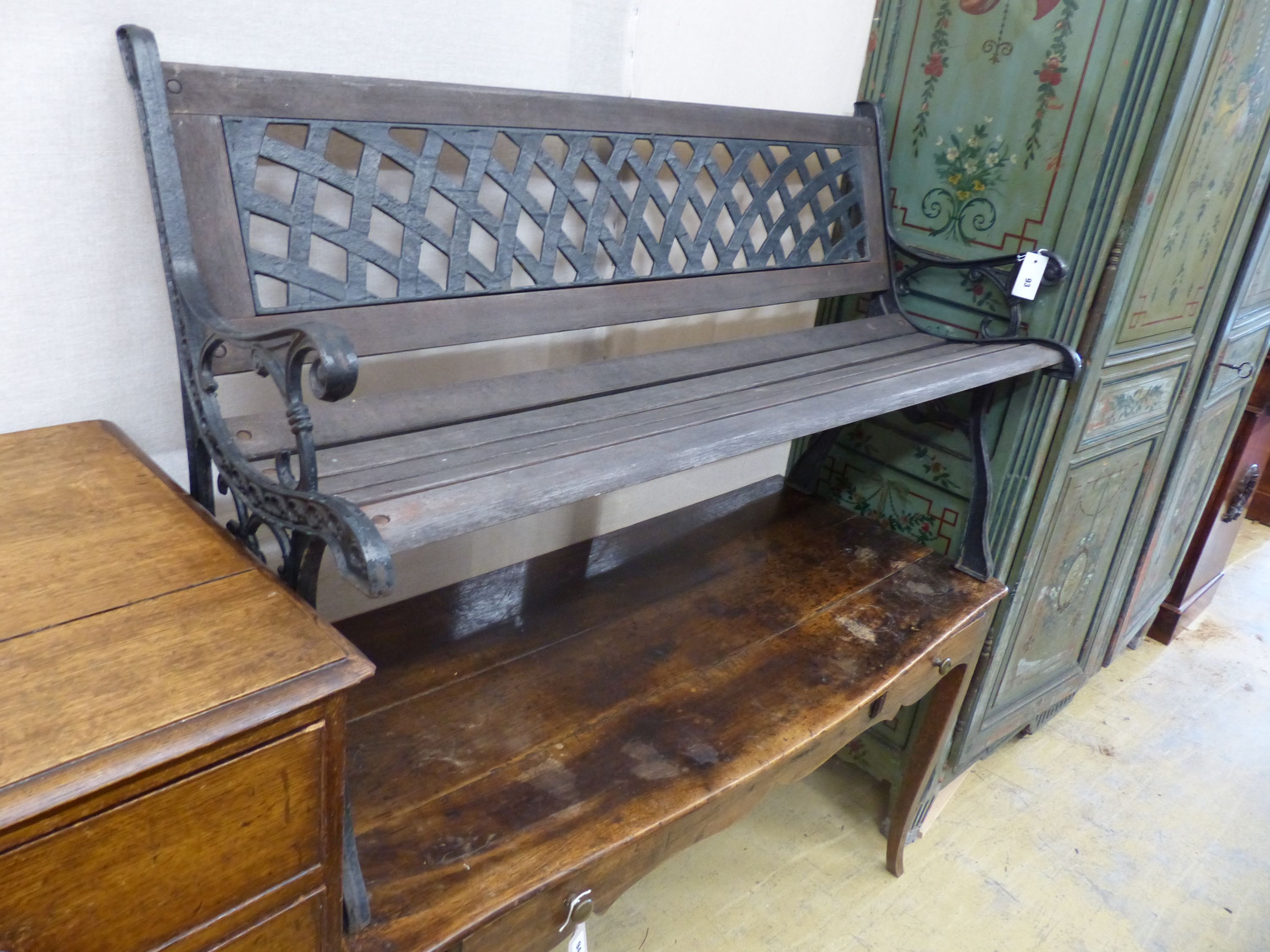 A painted cast metal garden bench, length 126cm, depth 52cm, height 80cm